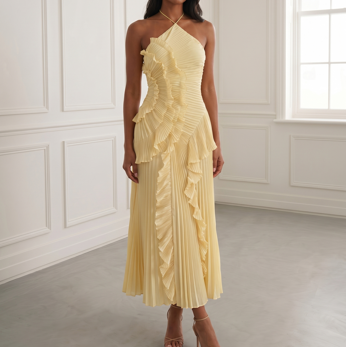 Woman wearing a yellow dress in a room with white walls and a window.